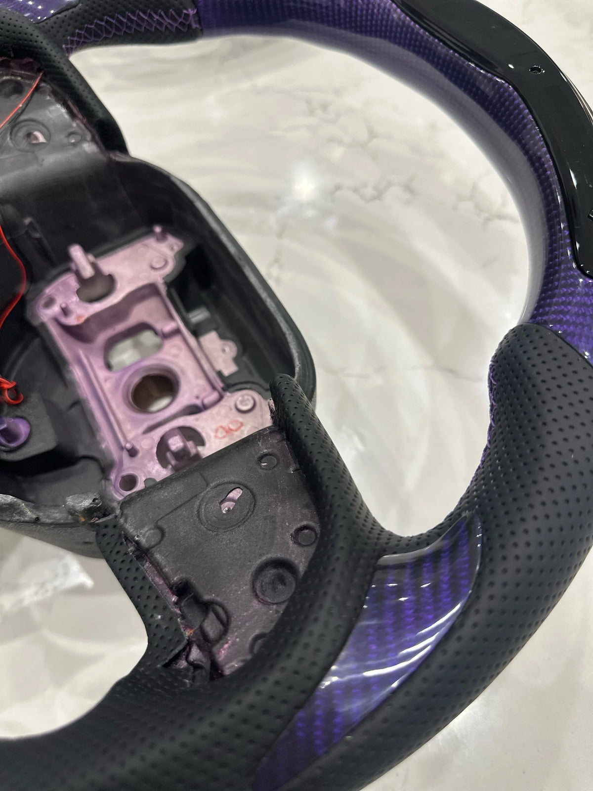 Purple carbon led steering wheel