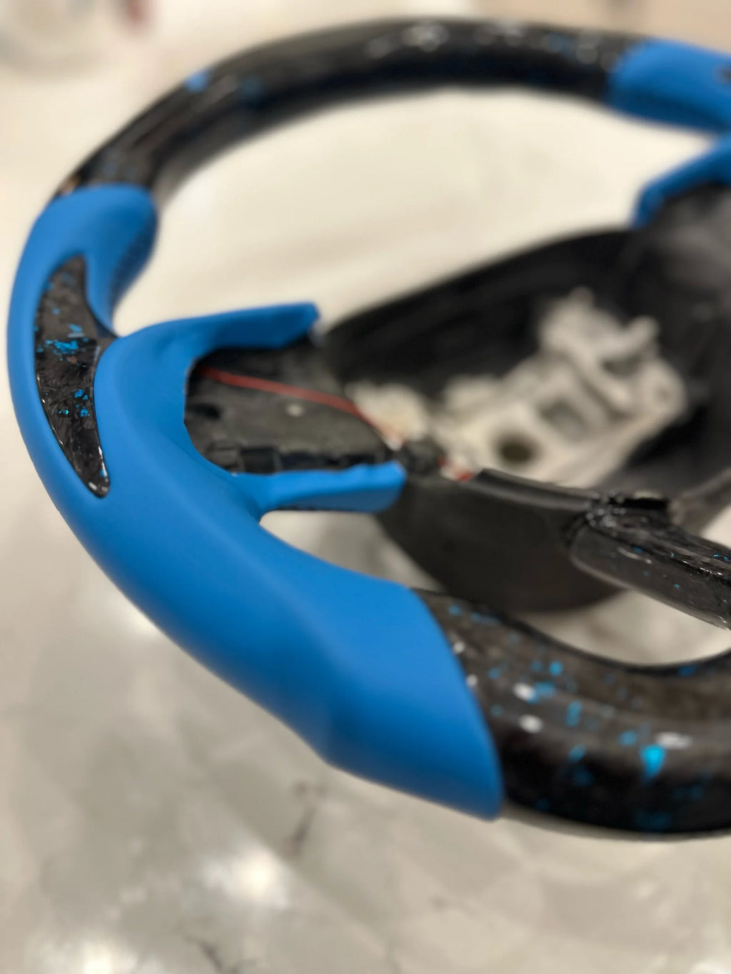 Blue forged carbon steering wheel