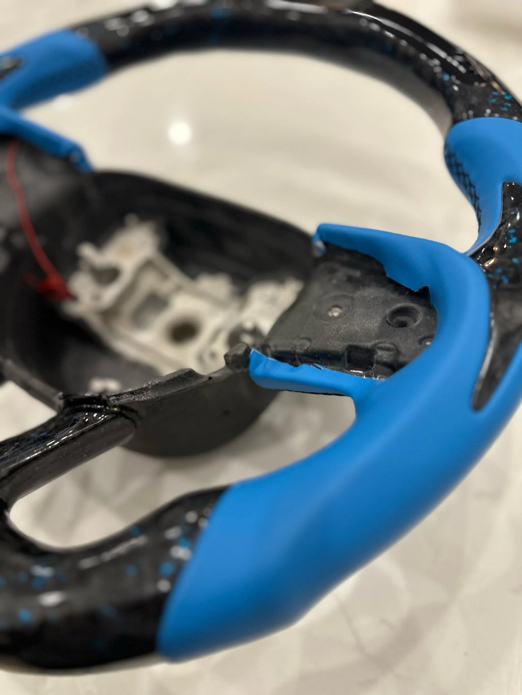 Blue forged carbon steering wheel