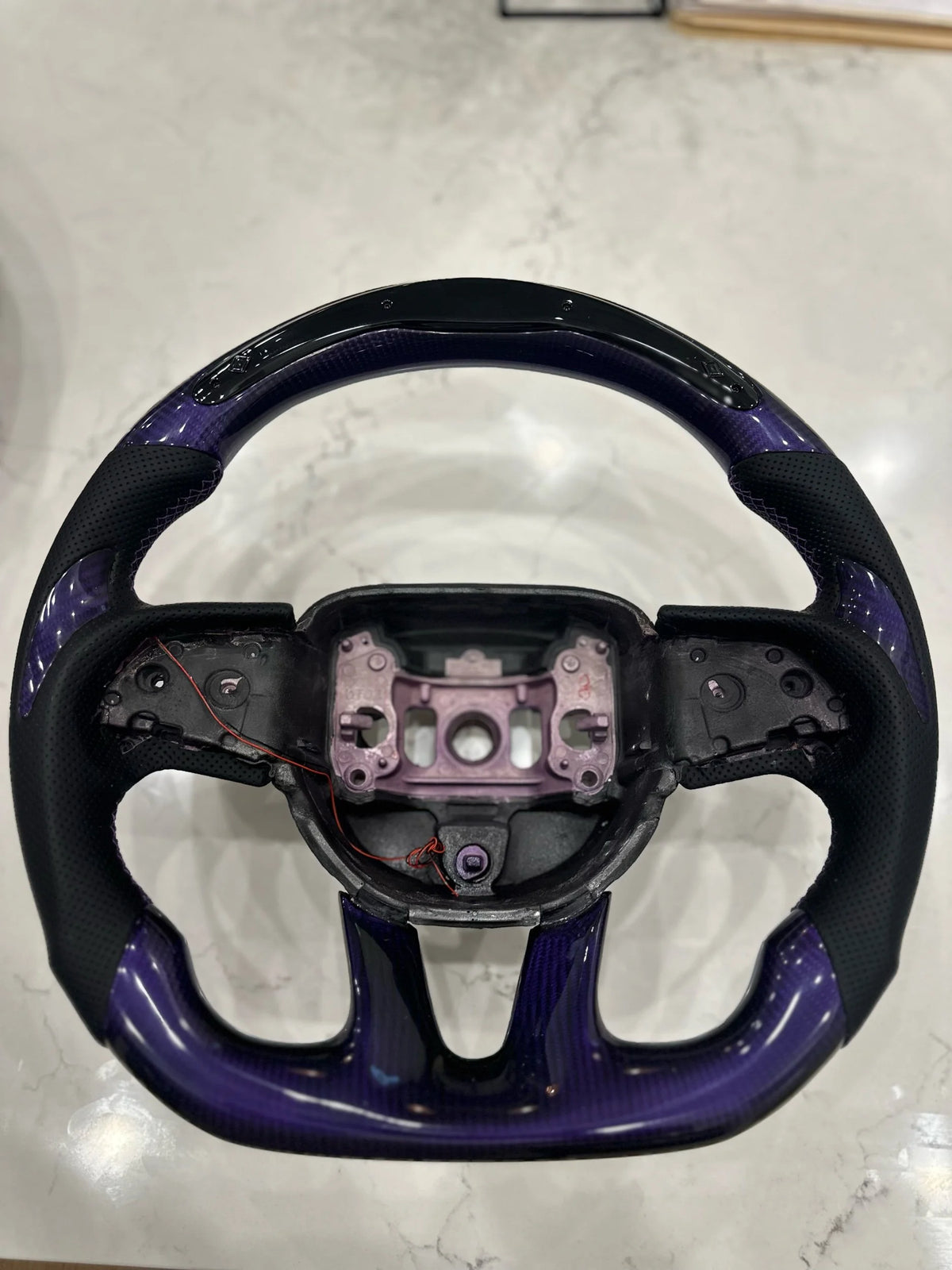 Purple carbon led steering wheel