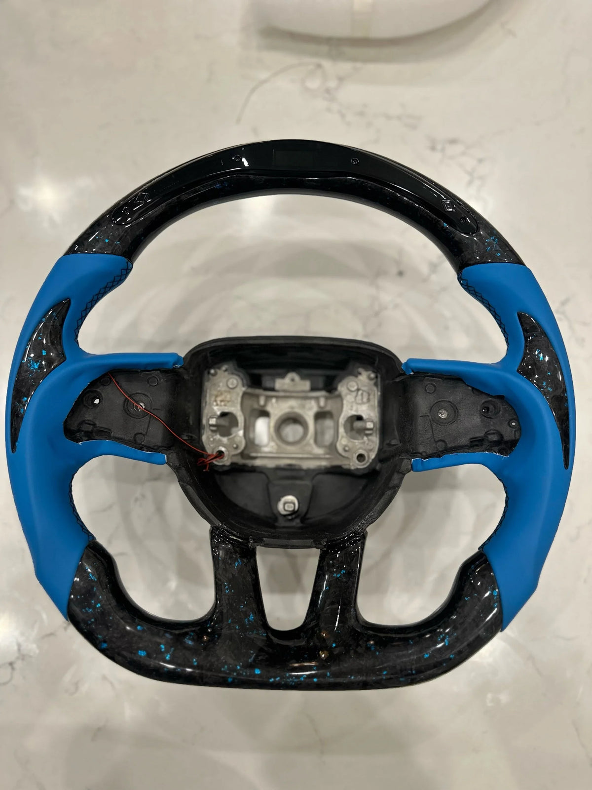 Blue forged carbon steering wheel