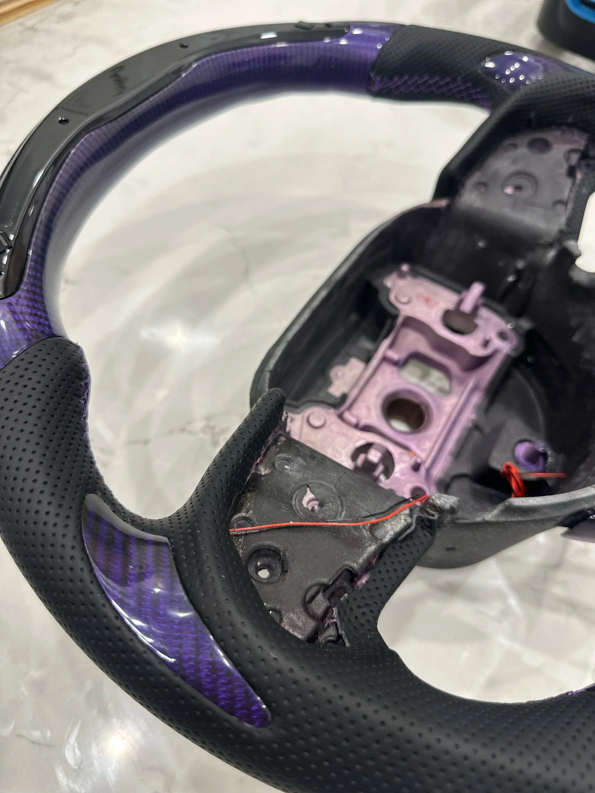Purple carbon led steering wheel