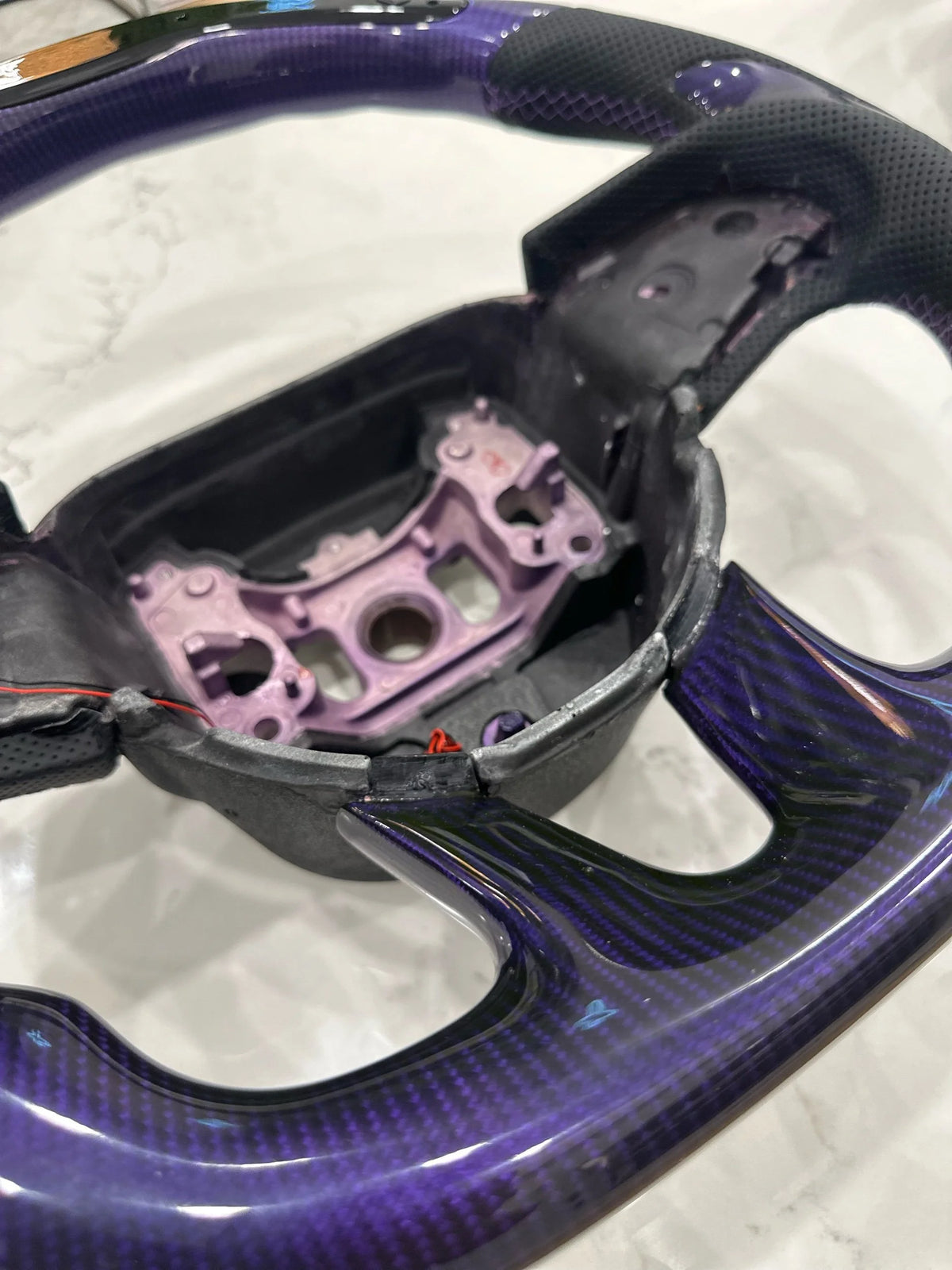Purple carbon led steering wheel